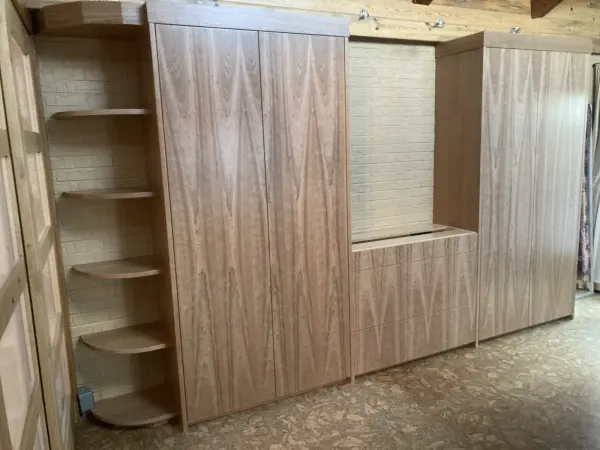 Full wall of built-in cabinets with matched grain