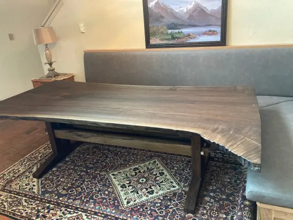 Live edge walnut table seen along its length