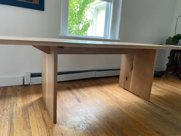 Solid white oak dining table with panel legs