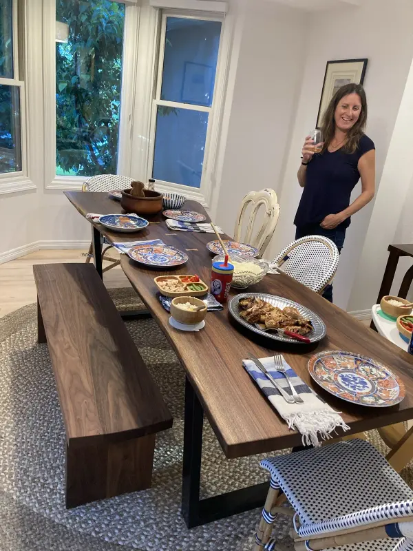 Walnut dining table set in a dining room
