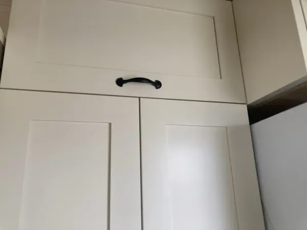Shaker style painted cream kitchen cabinets, installed